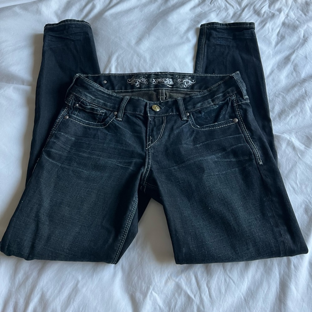Express dark wash skinny jeans